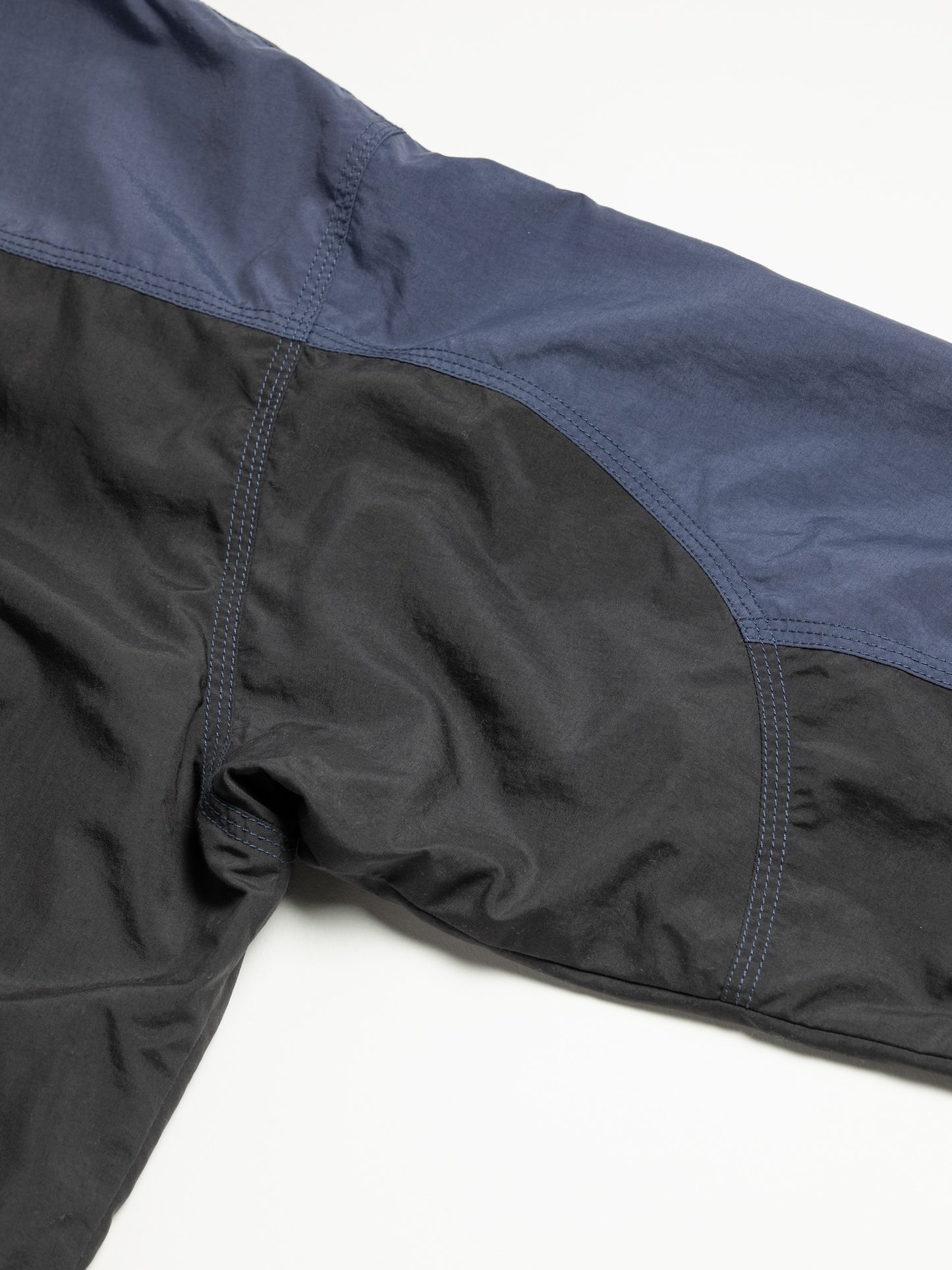 EXCHANGE PATTERN NYLON JACKET / Navy x black