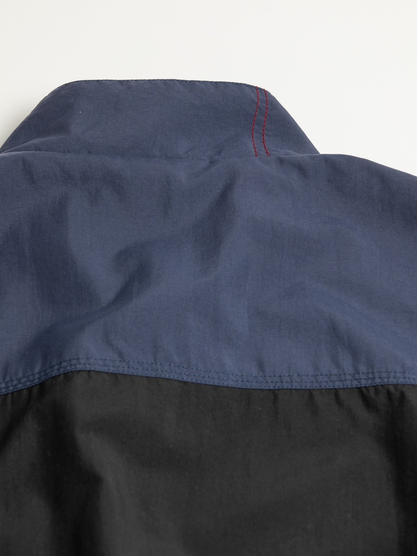 EXCHANGE PATTERN NYLON JACKET / Navy x black