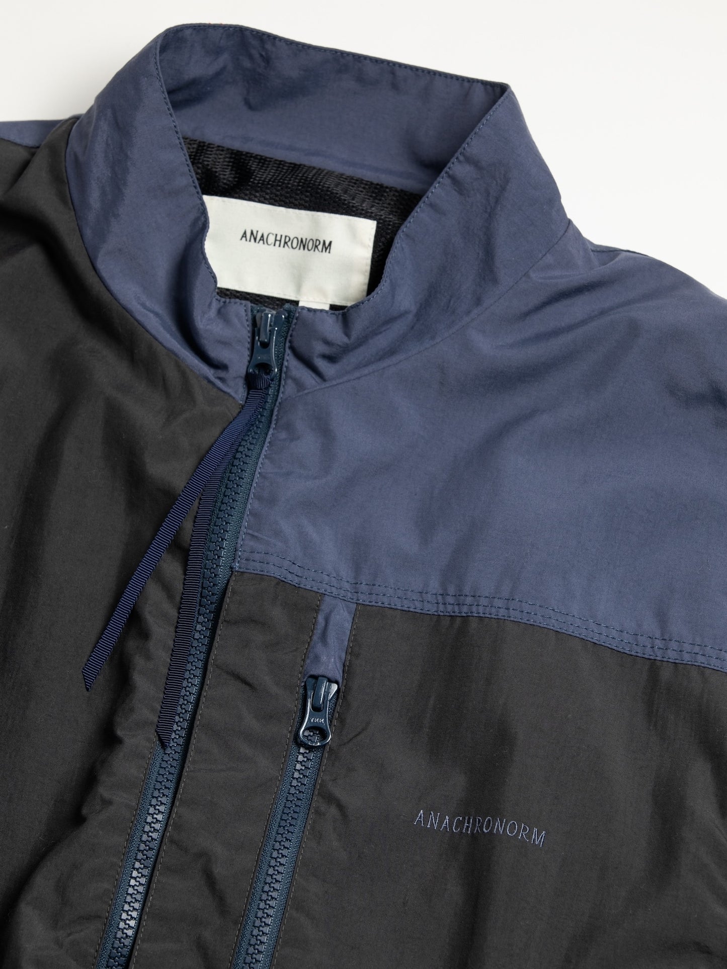 EXCHANGE PATTERN NYLON JACKET / Navy x black